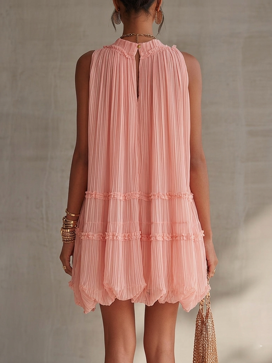 Agata | Mini abito rosa plissettato con scollo halter e volant